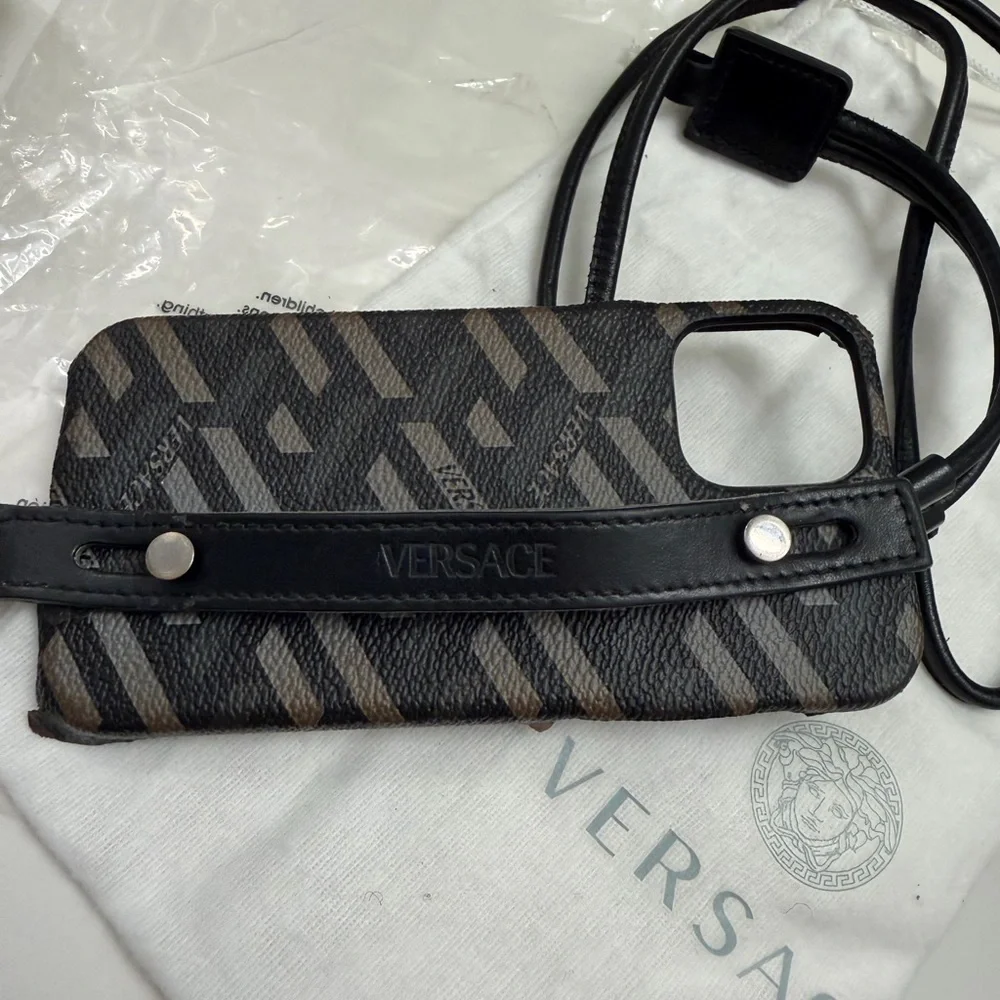 Versace Black Gray Patterned iPhone 12 hard cover with hand strap